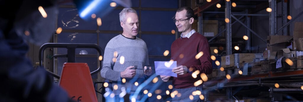 Aki Nevalainen and Pasi Karjalainen at PK-Levy Oy in Nurmes.